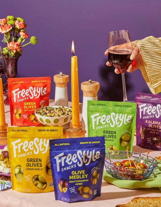 Lifestyle shot of the Olive Starter Pack Packaging spread out on a table