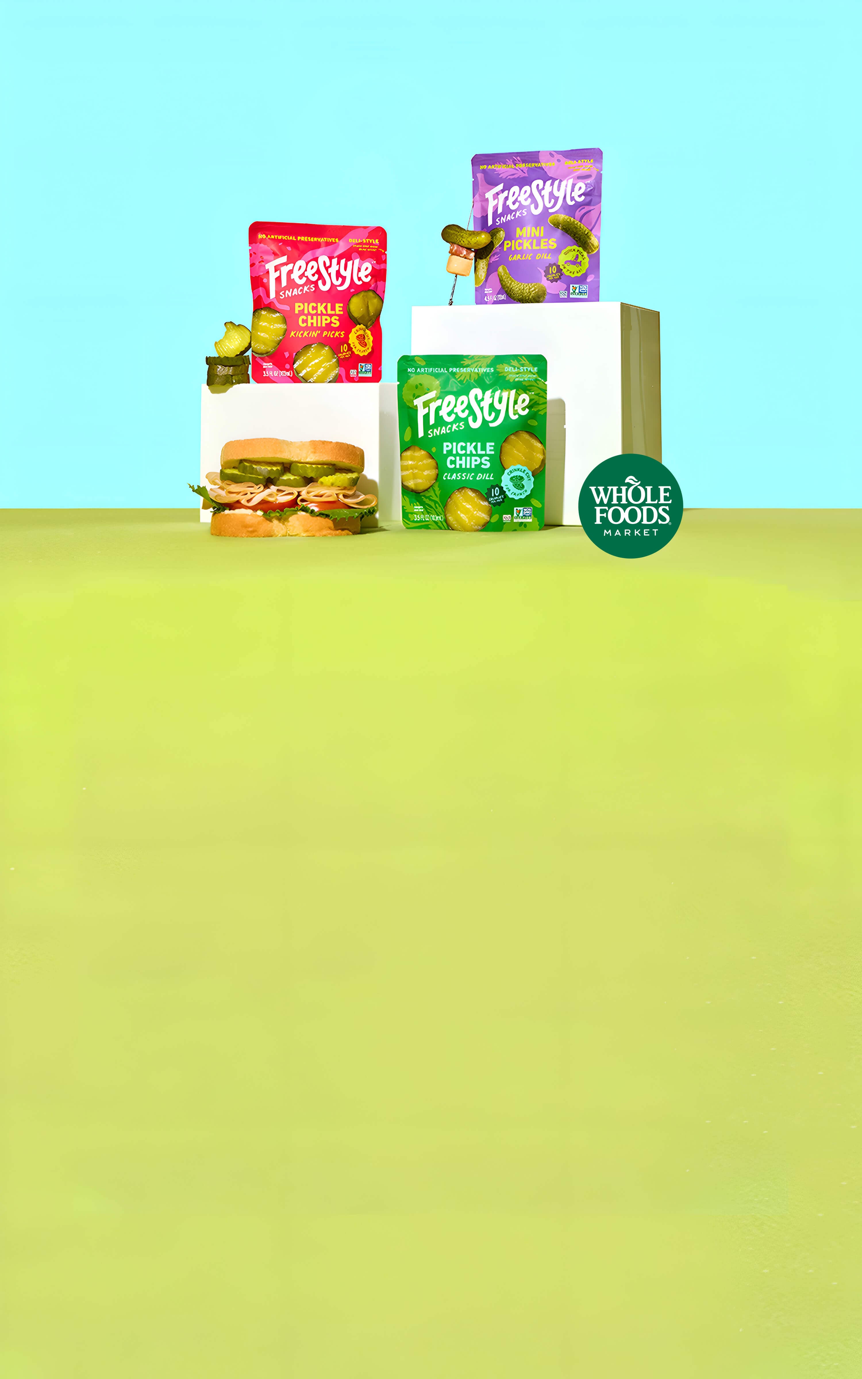 Freestyle Snacks products displayed on a gradient background.