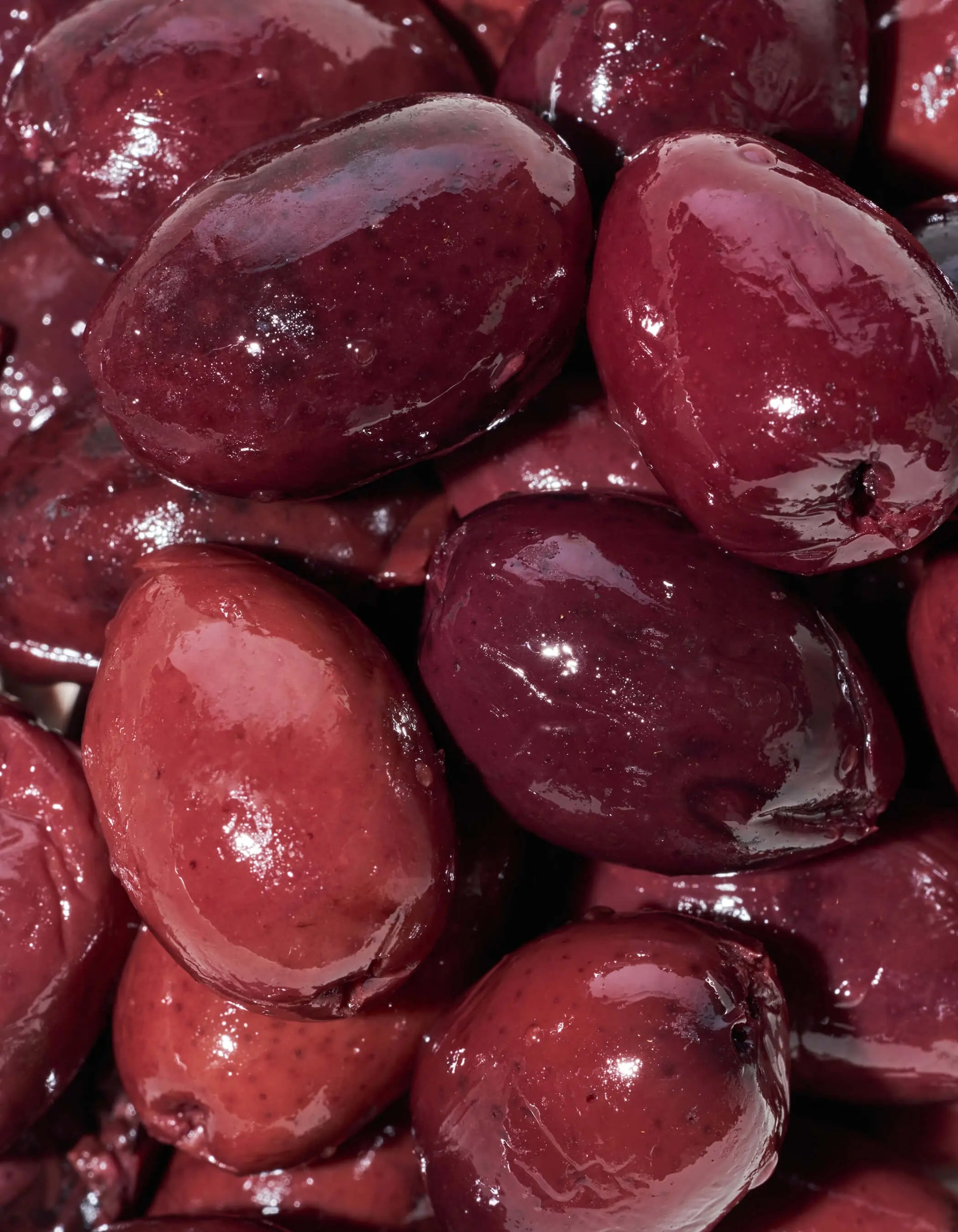 Close up of olives highlighting color and texture