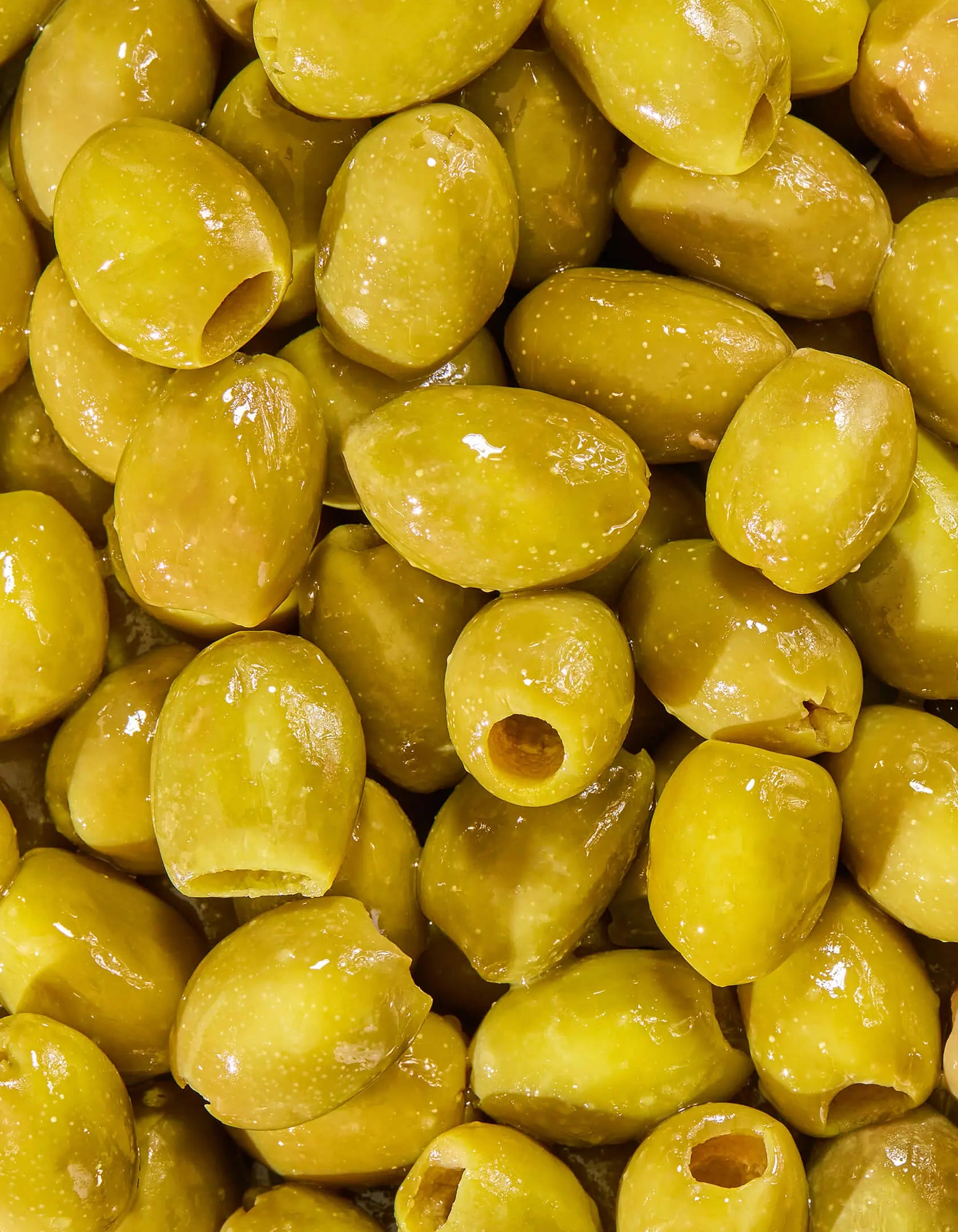 Close up of olives highlighting texture and color